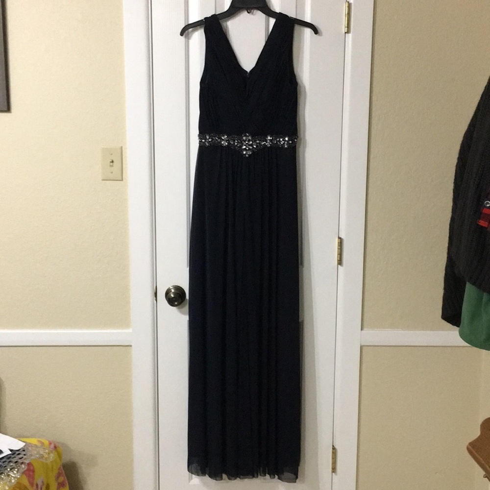 Sleeveless event gown with rhinestone waist